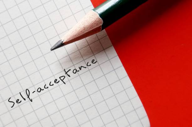 istock Pencil wrote on pape Self-acceptance - ability to accept both your strengths and personal faults without judgment 2176572308