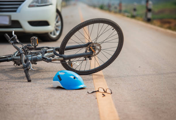 istock Accident car crash with bicycle on road because drunk driving. 2176577231