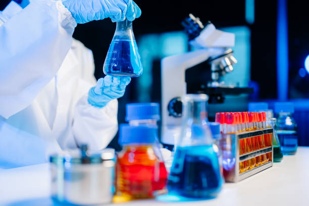 istock Biologist taking experiment with plants working in laboratory. 2176578947