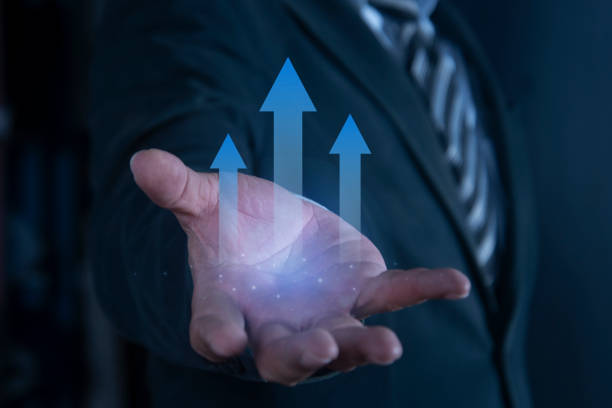 istock Businessman hand show plan growth business graph financial chart on improvement. Successful business and growth strategy concept. 2176583035