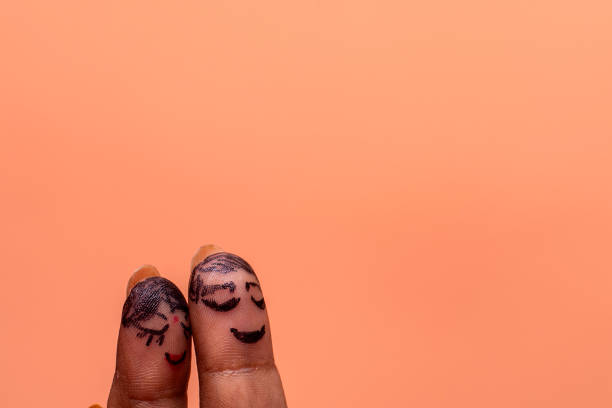 istock Romantic Concept of Two Fingers Hugging as a Couple 2176588106