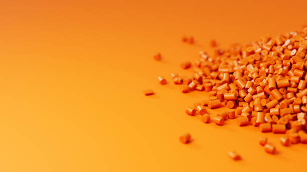 istock Closeup side view on orange plastic polypropylene granules heap on orange backdrop with shallow DOF, masterbatch polymer grain pile. HDPE or PVC resin pellets. 3d render illustration 2176592024