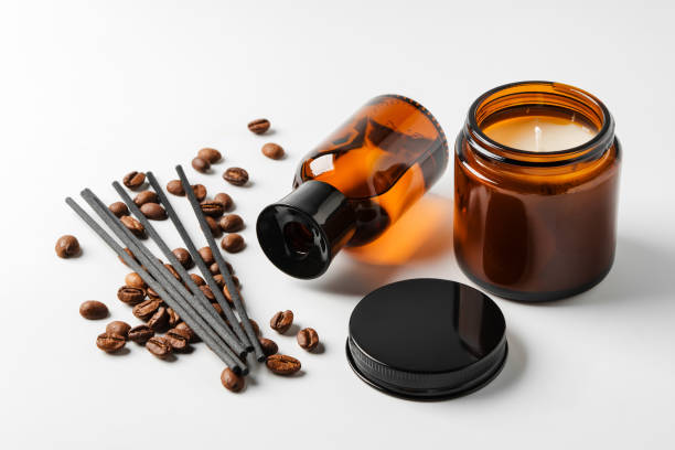 istock Aromatic coffee-scented candles and essential oils with coffee beans and incense sticks 2176593732