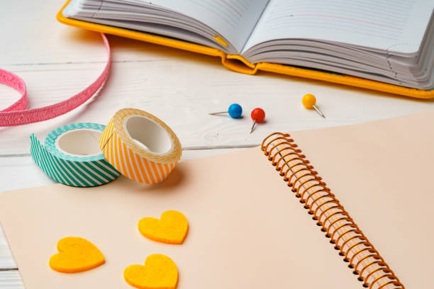 istock Creative workspace with colorful stationery and decorations on a white wooden desk 2176594892