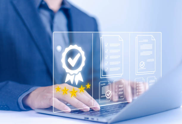 istock Businessman holding quality certification mark, audit, business, assurance, control, digital, service, complete, assessment, checklist, data with quality icon. 2176597042