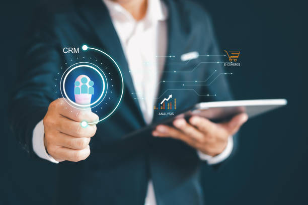 istock CRM for Business Marketing System Concept presented in a futuristic graphical interface of service application to support CRM database analysis. 2176600790