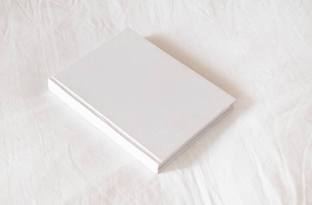 istock White book mockup on white hotel bed 2176601537