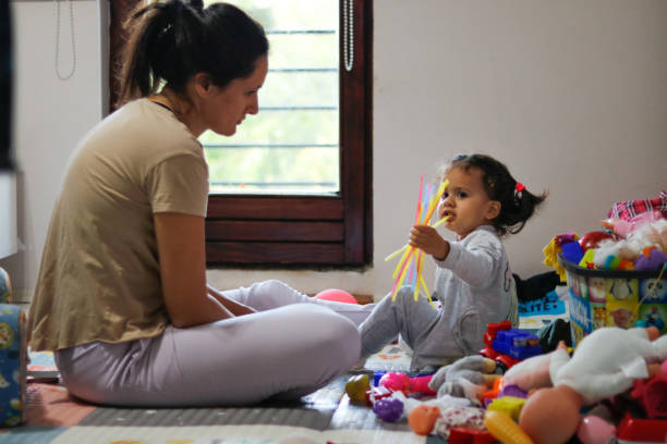 istock Mother and daughter learn to color with straws 2176603824