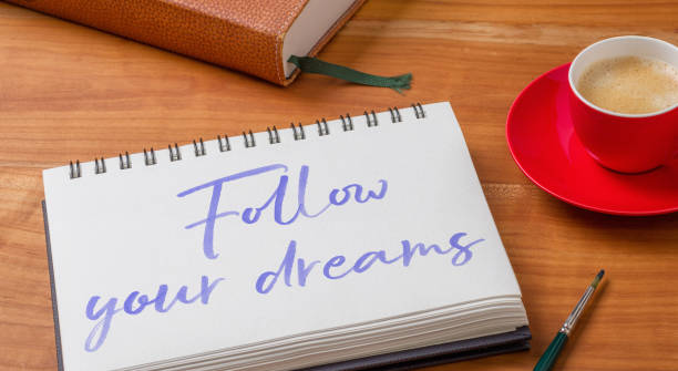 istock Notepad on a desk - Follow your dreams 2176608253