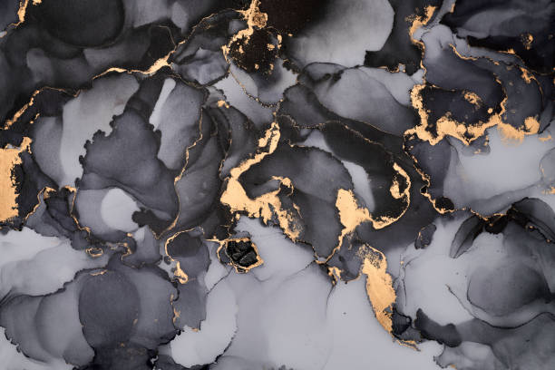 istock Snaking rivers of metallic gold weave through  vibrant interplay of soft and bold tones. Movement and balance in nature, crafted in the fluid ink technique to create seamless transitions  rich texture 2176609514