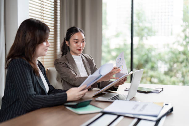istock Business Team Analyzing Reports for Strategic Planning. Concept of Teamwork and Data-Driven Decision Making 2176611567