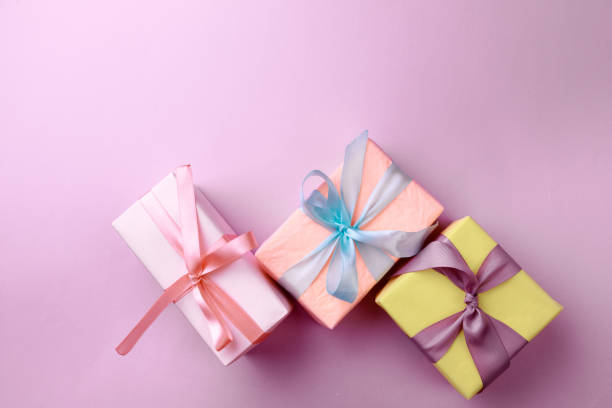 istock Gift boxes  on color background. Happy womens day. Happy Mothers day.Hello Spring 2176614036