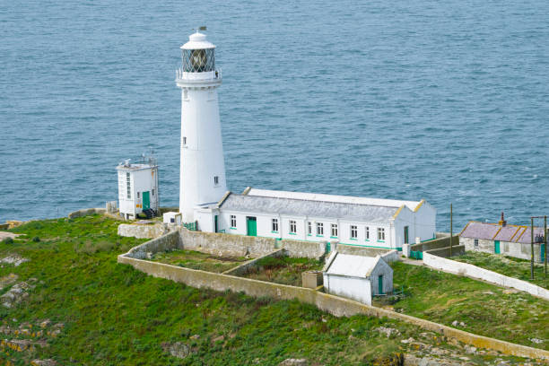 istock South Stack lighthouse on a small island off coast at Anglesea Wales. 2176614630