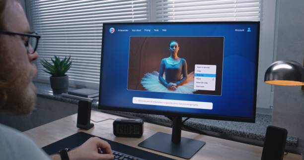 istock Adult man enters prompt in AI chatbot on personal computer 2176616295