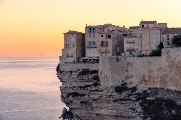 istock Cliffside Buildings Overlooking the Sea at Sunset 2176619143
