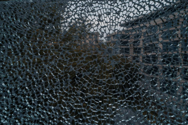istock Broken glass on the window of an old building. Abstract background. 2176619630
