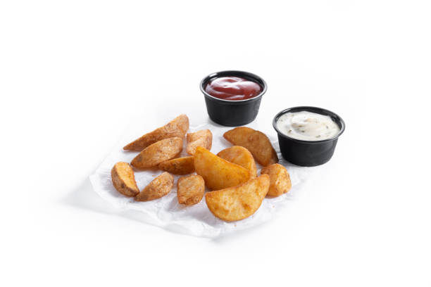 istock Fried potato wedges isolated on white background. 2176626404