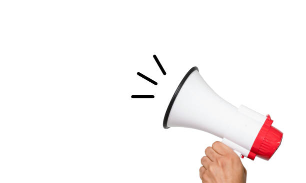 istock Hand holding megaphone shouting message isolated on white background 2176626855