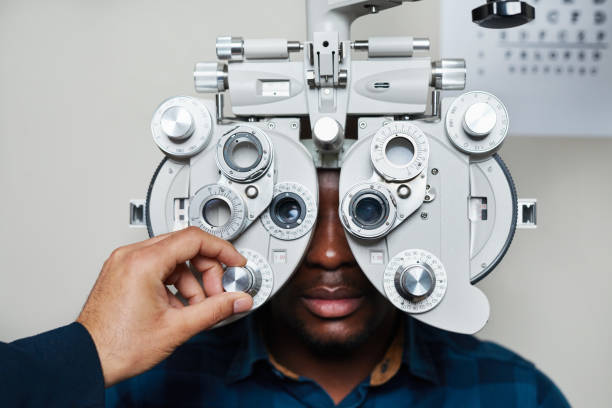 istock Optometrist Conducting Eye Exam with Advanced Equipment in Medical Practice 2176630695