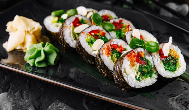 istock Gourmet sushi roll platter on dark slate 2176631209