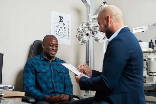 istock Friendly Optometrist Consultation with Smiling Patient in Modern Eye Clinic Setting 2176632421