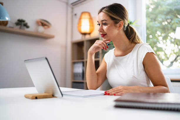 istock Young woman working at the office 2176640494