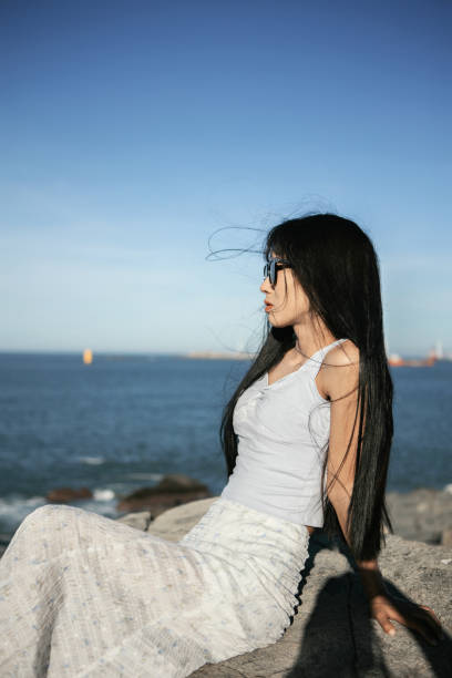 portrait of a beautiful girl on the water in nature. High quality photo
