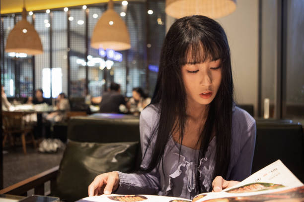istock Asian women reading menus in restaurants 2176646981