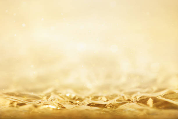 Abstract golden background with focus line for product presentation.
