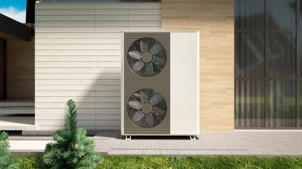 istock Heat pump is installed on the side of a modern home 2176650556