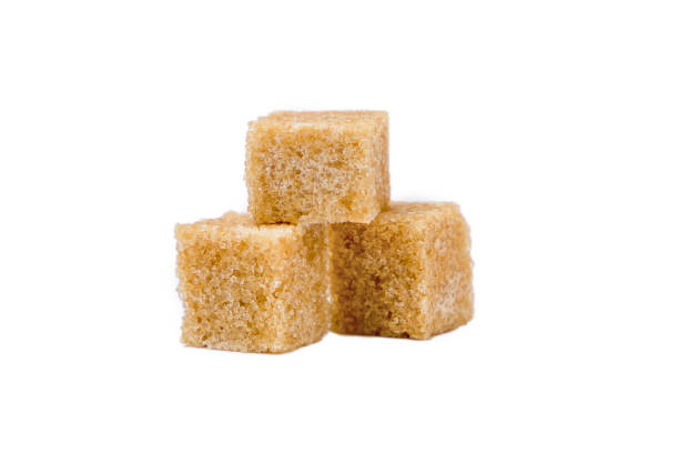 istock Brown cane sugar cubes isolated on white background, clipping path included. 2176654302