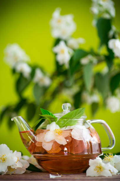 istock jasmine flower tea in a glass teapot 2176657928