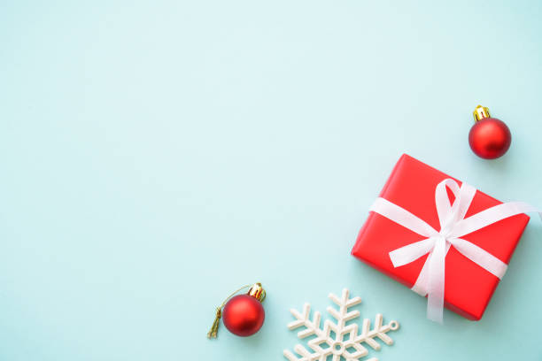 istock Christmas background. Christmas present box and decorations at blue. 2176661573