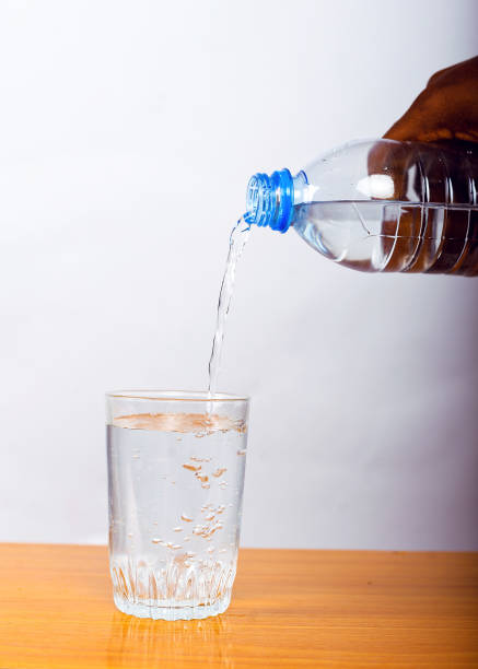 istock Pouring Water into Glass 2176665716
