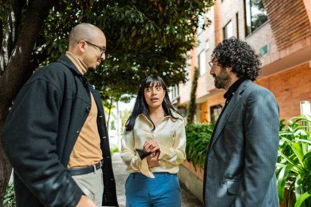 istock Coworkers talking in the city 2176672238