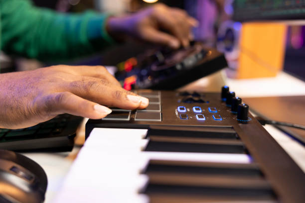 istock Skilled audio engineer editing songs in post production with mixing and mastering 2176678309