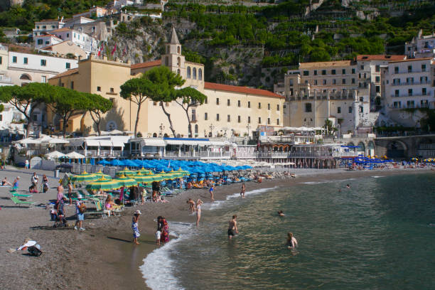 Rocky coast and Tyrrhenian Sea blue waters near Positano, Amalfi coast Italy