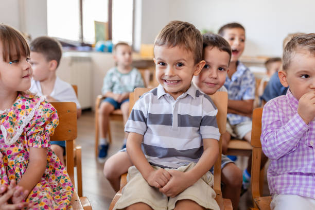 istock Kids enjoy the classroom experience with joyful smiles. 2176684717