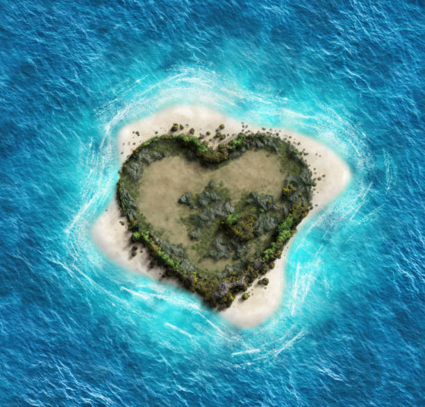 istock Heart shaped island surrounded by blue ocean water 2176686890