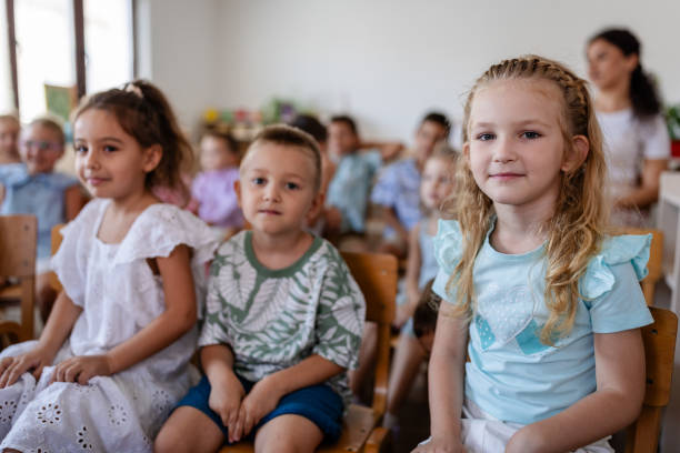 istock Confident children participating in classroom activities. 2176691438