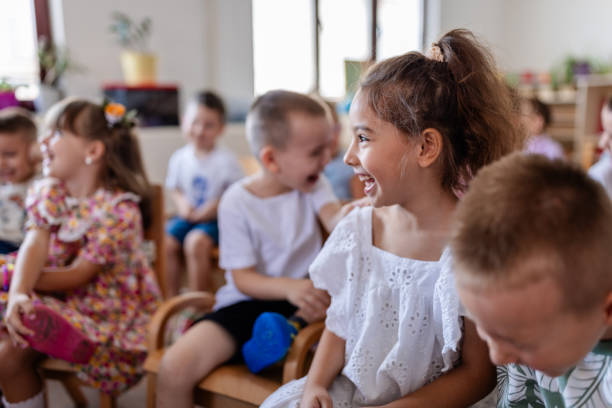 istock Close-up of seated children facing the front 2176692032