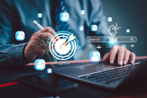 istock SEO Search Engine Optimization concept. Businessman use AI target icon, SEO website to rank search engines or SEO. Search with Ai assistant on computer screen. Artificial Intelligence data technology 2176692216