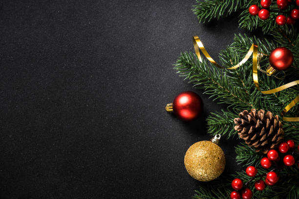 Christmas holiday background on black.