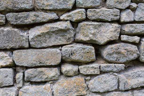 istock Fragment of stone wall of ancient defensive structure 2176696388