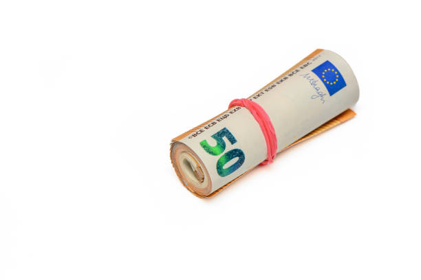 Close-up of a bundle of fifty euro bank notes bound with rubber band