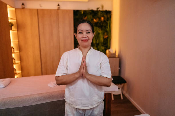 istock Female Massage Therapist Standing In The Spa 2176700778