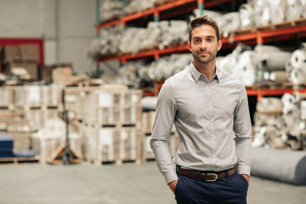 istock Warehouse manager standing on the floor of his warehouse 2176718021