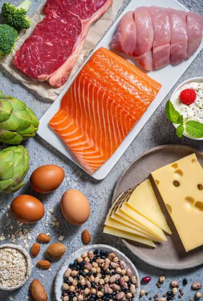 istock Assorted healthy protein sources for body building and healthy eating on a kitchen table. 2176721659