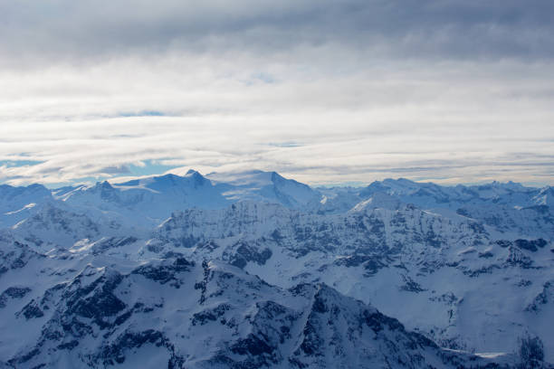 Beautiful low winter clouds and fog condensation in the Swiss Alps during a polar cold snap, Amden - Canton of St. Gallen, Switzerland (Schweiz)