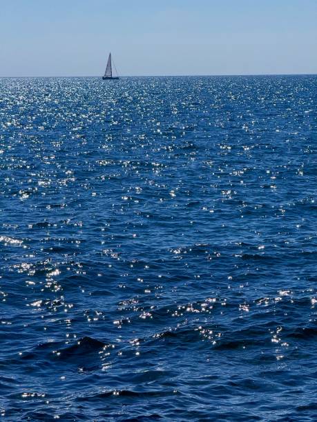 istock Sailboat in blue shiny sea 2176723462